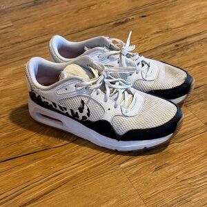 Nike womens White and Black Sneakers with Graphic Swoosh